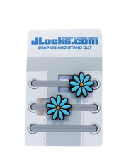 Flower-shaped shoe lace locks on a JLocks.com branded card with a white background