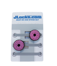 Pink donut-shaped shoe lace locks on a JLocks.com branded card with gray shoelaces.